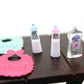 Dolls House Miniature Baby Bottles Shampoo Bibs Set Nursery Accessory Gift